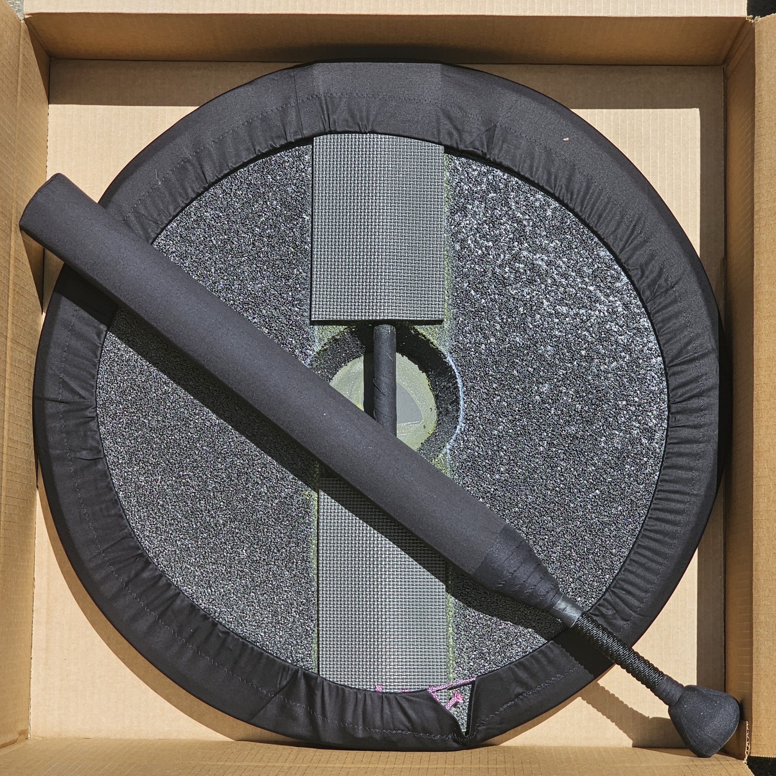Bat and Board Set in shipping box just as it comes. Covered in Black Fabric. Includes 27" foam punch shield and 34" Boffer combat bat