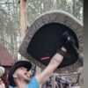 Foam Fighter Thunderbird triumphantly holding his custom made wing shield.