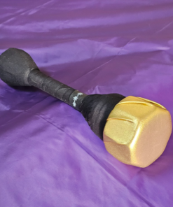 Stab Only Dagger with Golden Cover on a purple background