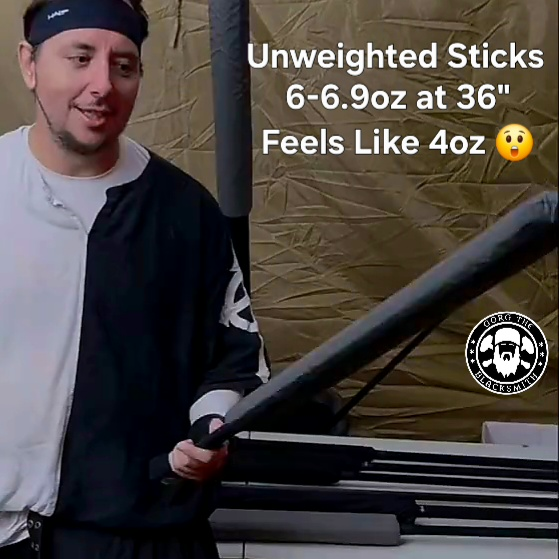 Unweighted Sticks - A Larp Athlete is holding a foam sword in shock that it weighs 6oz because it feels like 4oz